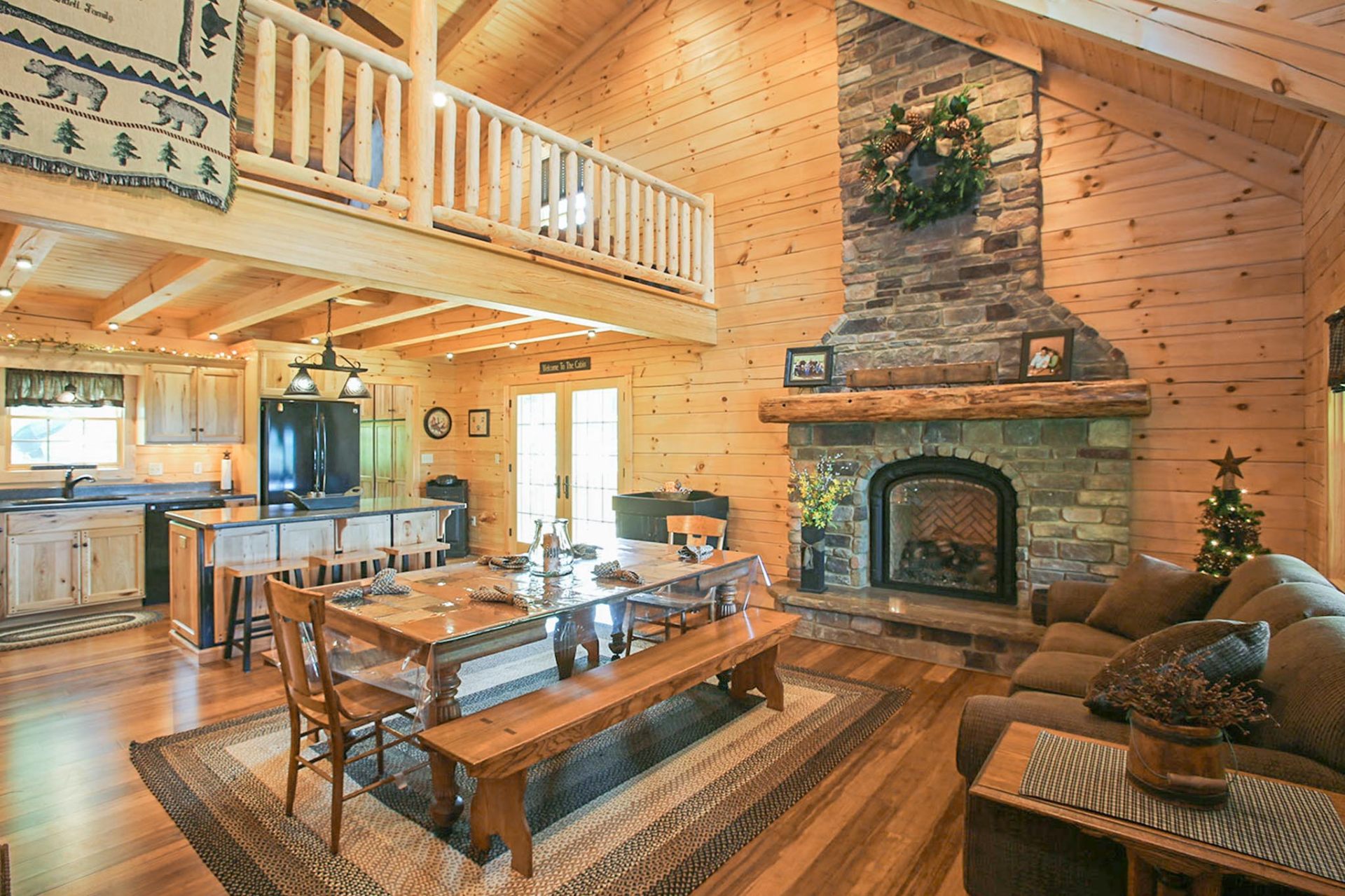Shade Mountain II great room with stone fireplace and loft